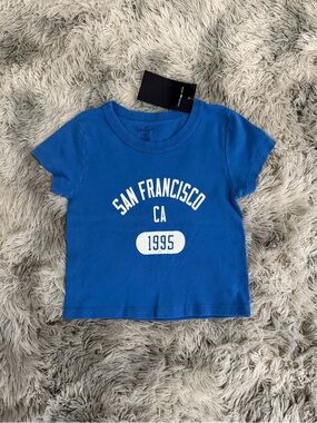 RARE BRANDY MELVILLE NWT San
Francisco Ashlyn top blue baby tee